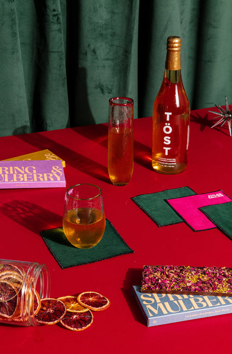 Stemless champagne flutes styled on table setting