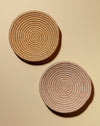 Woven sisal basket styled as wall decor with hanging loop